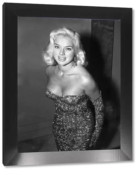 Diana Dors in the dress she wore to the premiere of the film An Alligator Named Daisy at
