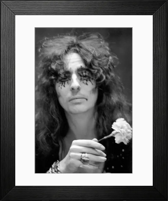Framed Print : Pop singer Alice Cooper aged 23 flew into Heathrow Airport today with his pet boa Framed Print : Pop singer Alice Cooper aged 23 flew into Heathrow Airport today with his pet boa