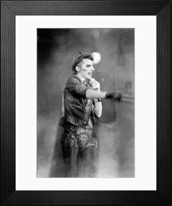 Framed Print : American rock singer Alice Cooper performing in concert at the Hammersmith Odeon during
