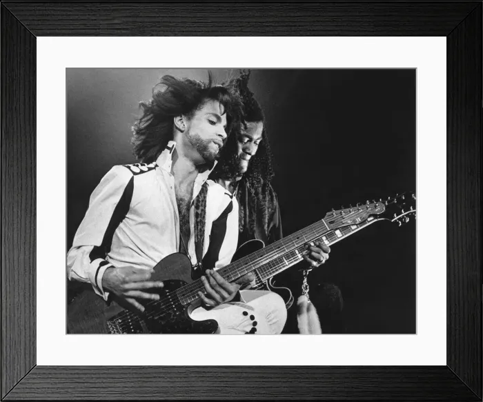 Framed Print : Prince performing on stage during The Nude Tour Framed Print : Prince performing on stage during The Nude Tour