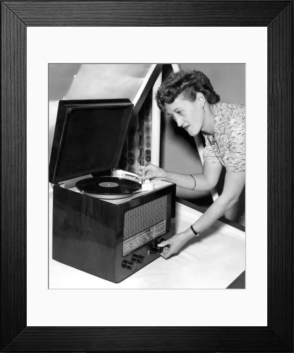 Framed Print : Peggy Kingston of Chiswick with a Philips minature table radiogram, TBIS 5 Valve Model Framed Print : Peggy Kingston of Chiswick with a Philips minature table radiogram, TBIS 5 Valve Model