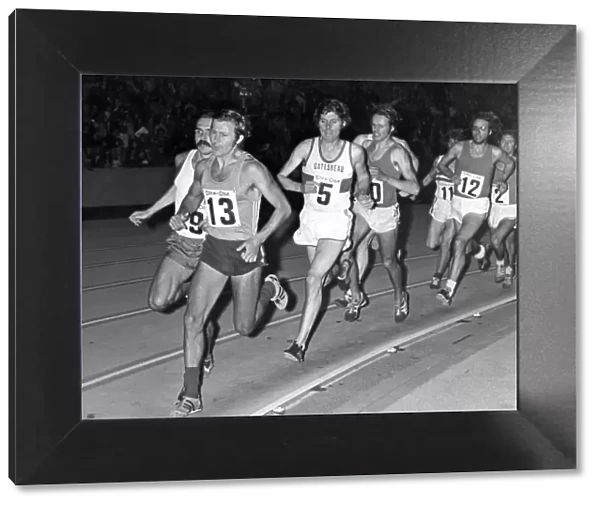 Brendan Foster (5) is handly placed as they come round a bend in the two mile event