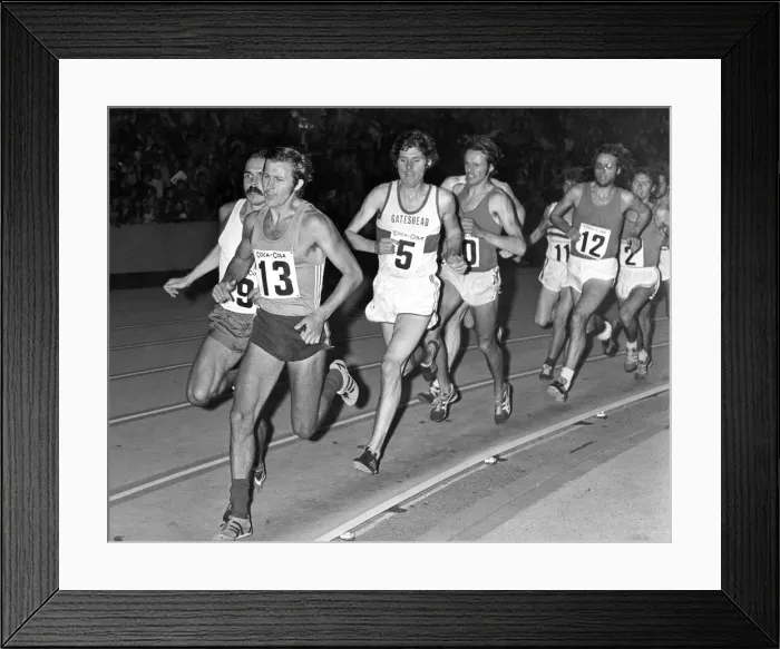 Framed Print : Brendan Foster (5) is handly placed as they come round a bend in the two mile event Framed Print : Brendan Foster (5) is handly placed as they come round a bend in the two mile event
