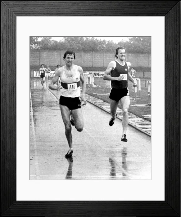 Framed Print : Brendan Foster squelches through the rain in an open athletics meeting at Gateshead in Framed Print : Brendan Foster squelches through the rain in an open athletics meeting at Gateshead in
