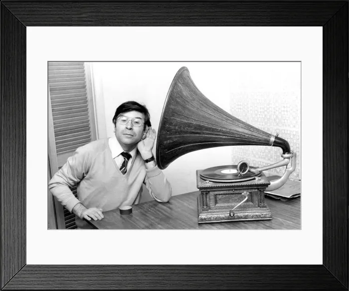 Framed Print : Opera singer and research scientist Phillip Bailey who collects music boxes