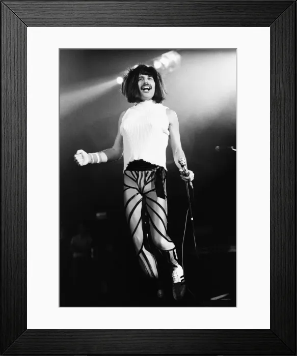 Framed Print : Rock group Queen in concert at Wembley Arena. Lead singer Freddie Mercury Framed Print : Rock group Queen in concert at Wembley Arena. Lead singer Freddie Mercury