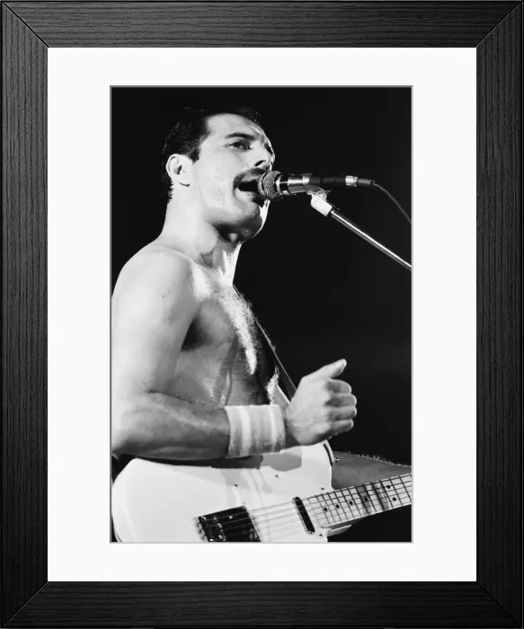 Framed Print : Rock group Queen in concert at Wembley Arena. Lead singer Freddie Mercury Framed Print : Rock group Queen in concert at Wembley Arena. Lead singer Freddie Mercury