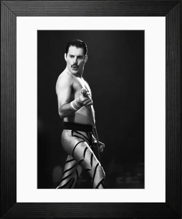Framed Print : Rock group Queen in concert at Wembley Arena. Lead singer Freddie Mercury Framed Print : Rock group Queen in concert at Wembley Arena. Lead singer Freddie Mercury