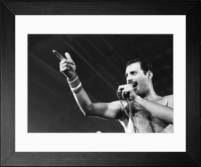 Framed Print : Rock group Queen in concert at Wembley Arena. Lead singer Freddie Mercury Framed Print : Rock group Queen in concert at Wembley Arena. Lead singer Freddie Mercury