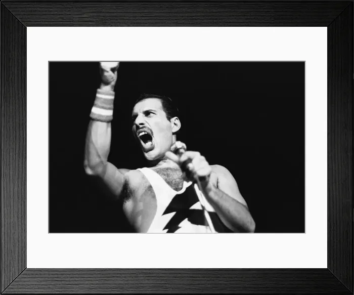 Framed Print : Rock group Queen in concert at Wembley Arena. Lead singer Freddie Mercury Framed Print : Rock group Queen in concert at Wembley Arena. Lead singer Freddie Mercury