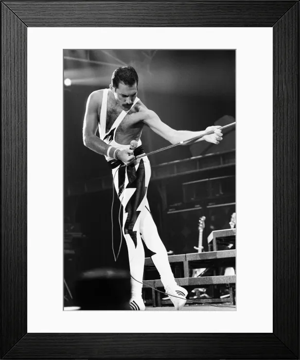 Framed Print : Rock group Queen in concert at Wembley Arena. Lead singer Freddie Mercury Framed Print : Rock group Queen in concert at Wembley Arena. Lead singer Freddie Mercury