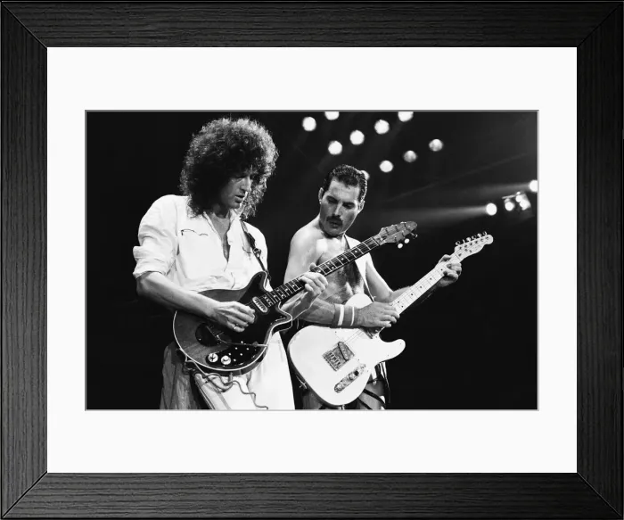 Framed Print : Rock group Queen in concert at Wembley Arena. Lead singer Freddie Mercury Framed Print : Rock group Queen in concert at Wembley Arena. Lead singer Freddie Mercury