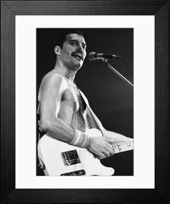 Framed Print : Rock group Queen in concert at Wembley Arena. Lead singer Freddie Mercury Framed Print : Rock group Queen in concert at Wembley Arena. Lead singer Freddie Mercury