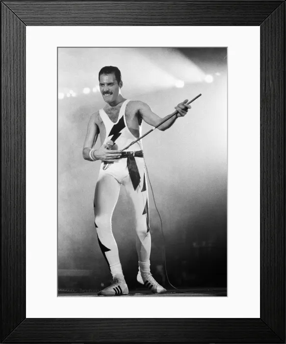 Framed Print : Rock group Queen in concert at Wembley Arena. Lead singer Freddie Mercury Framed Print : Rock group Queen in concert at Wembley Arena. Lead singer Freddie Mercury