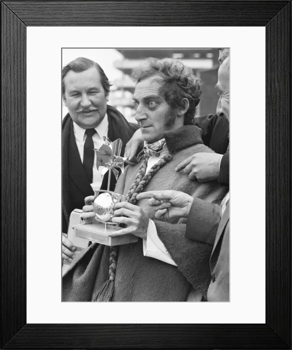 Framed Print : Marty Feldman seen here on his return from the Monteaux TV awards with his award for best Framed Print : Marty Feldman seen here on his return from the Monteaux TV awards with his award for best