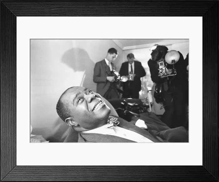 Framed Print : Louis Armstrong seen here giving a press conference at the Mayfair Hotel Framed Print : Louis Armstrong seen here giving a press conference at the Mayfair Hotel