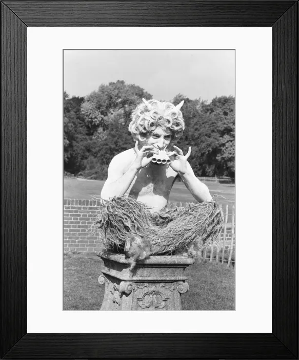 Framed Print : Zany comedian Marty Feldman seen here as the god Pan in Holland Park, London Framed Print : Zany comedian Marty Feldman seen here as the god Pan in Holland Park, London