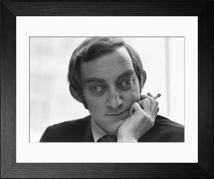 Framed Print : Zany comedian Marty Feldman seen here at lunch during a break in the filming of Framed Print : Zany comedian Marty Feldman seen here at lunch during a break in the filming of
