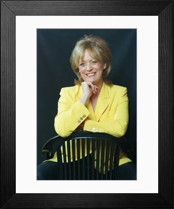 Framed Print : Actress Sherrie Hewson in her restaurant Booms in Richmond, sitting on a chair Framed Print : Actress Sherrie Hewson in her restaurant Booms in Richmond, sitting on a chair