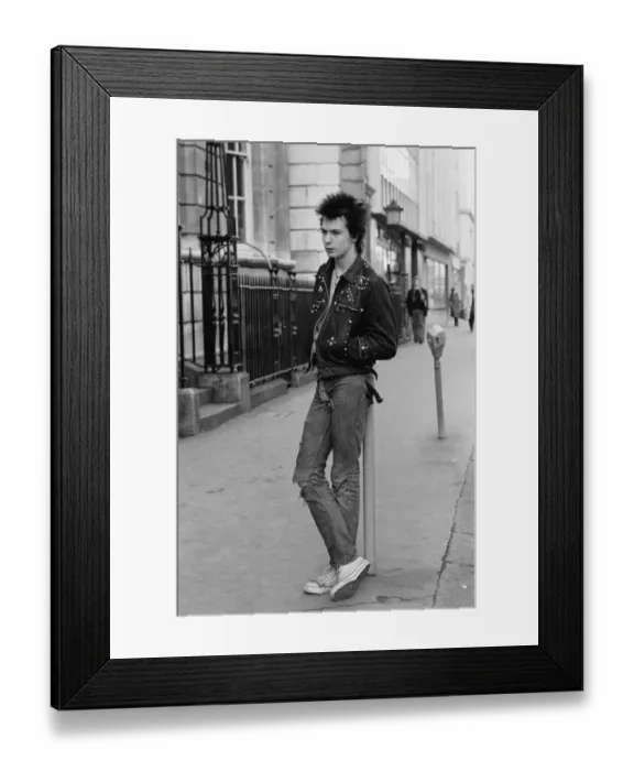 Framed Print : Sex Pistols bass guitarist Sid Vicious pictured in London. 29th March 1977