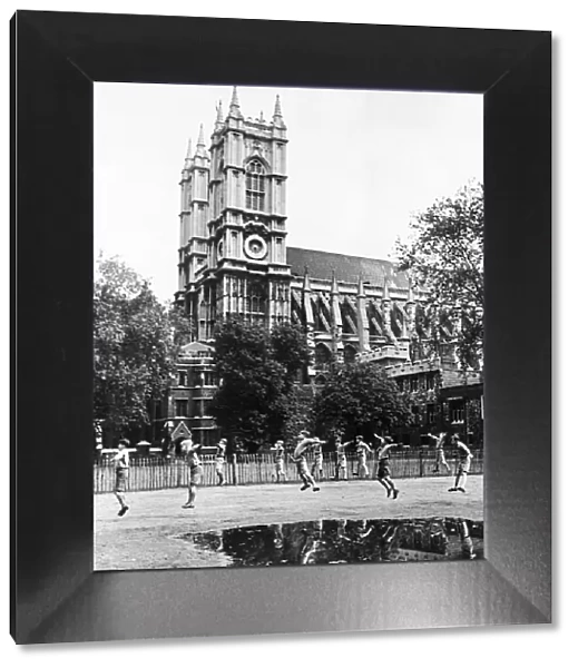Children of the Westminster School seen here doing PT, with Westminster Abbey in