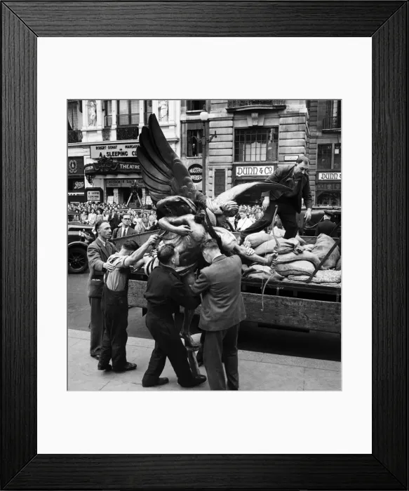 Framed Print : Eros returns to Piccadilly Circus following the end of the second world war. June 1947 Framed Print : Eros returns to Piccadilly Circus following the end of the second world war. June 1947