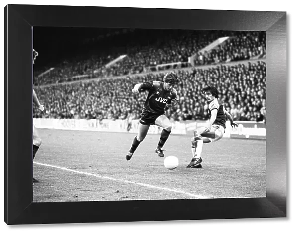 West Ham v. Arsenal. Kenny Samson goes past Alan Devonshire 10th May 1983