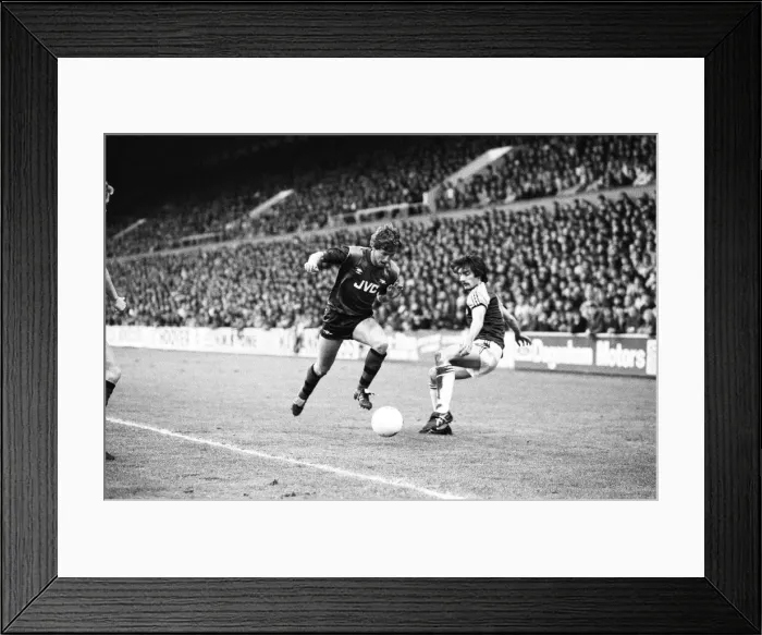Framed Print : West Ham v. Arsenal. Kenny Samson goes past Alan Devonshire 10th May 1983 Framed Print : West Ham v. Arsenal. Kenny Samson goes past Alan Devonshire 10th May 1983