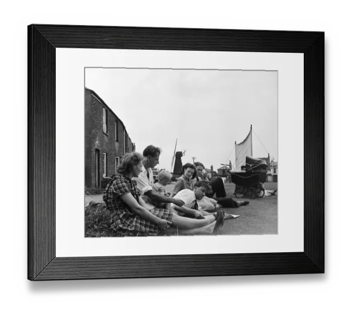 Framed Print : Villagers gather beside the village green at Meopham, Kent to watch their local cricket