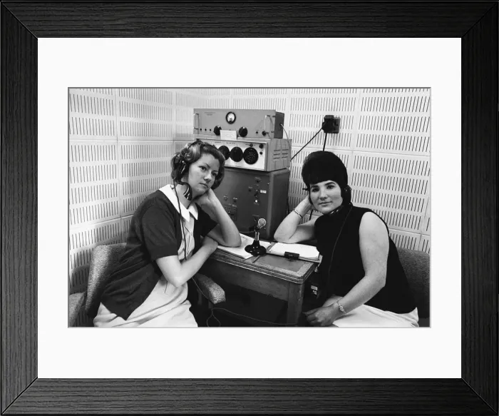 Framed Print : Telephone test match score recordists pose beside their equipment. 16th July 1968 Framed Print : Telephone test match score recordists pose beside their equipment. 16th July 1968