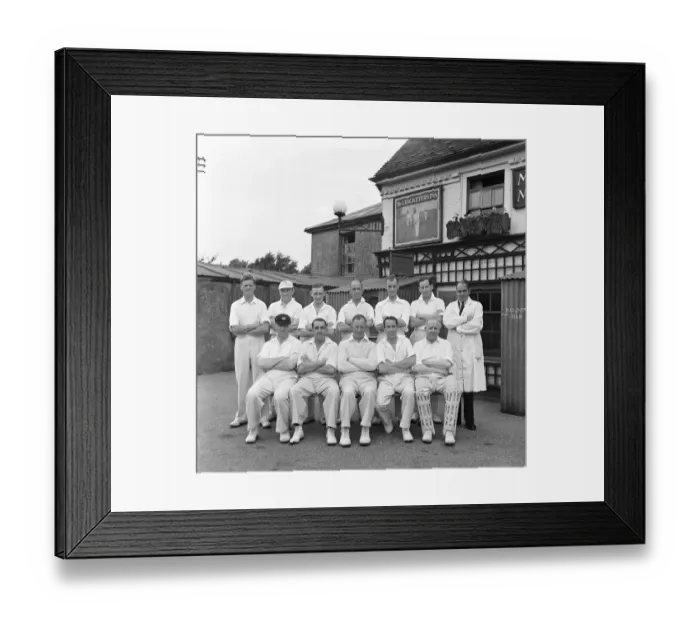 Framed Print : A cricket team poses outside The Cricketers public house in Meopham in Kent Circa June Framed Print : A cricket team poses outside The Cricketers public house in Meopham in Kent Circa June