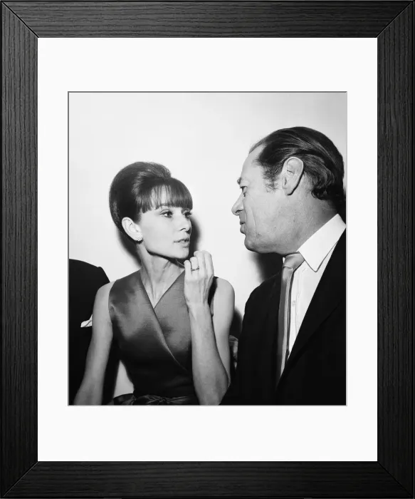 Framed Print : Actress Audrey Hepburn pictured with Rex Harrison at a press reception at the Savoy Hotel Framed Print : Actress Audrey Hepburn pictured with Rex Harrison at a press reception at the Savoy Hotel
