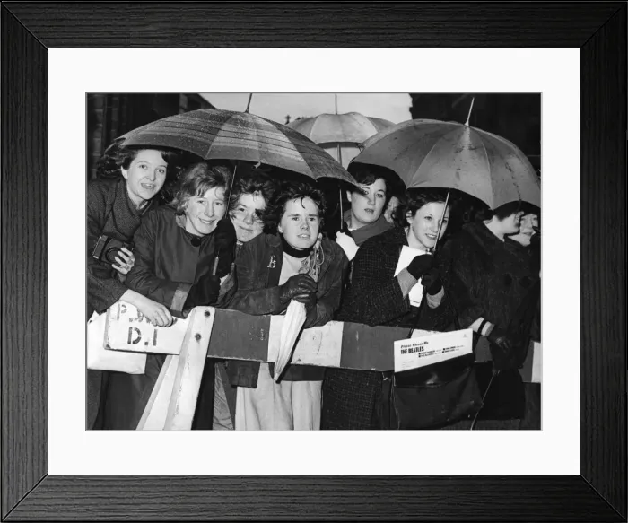 Framed Print : A group of girls who waited in the rain to greet their idols outside the Birmingham Framed Print : A group of girls who waited in the rain to greet their idols outside the Birmingham