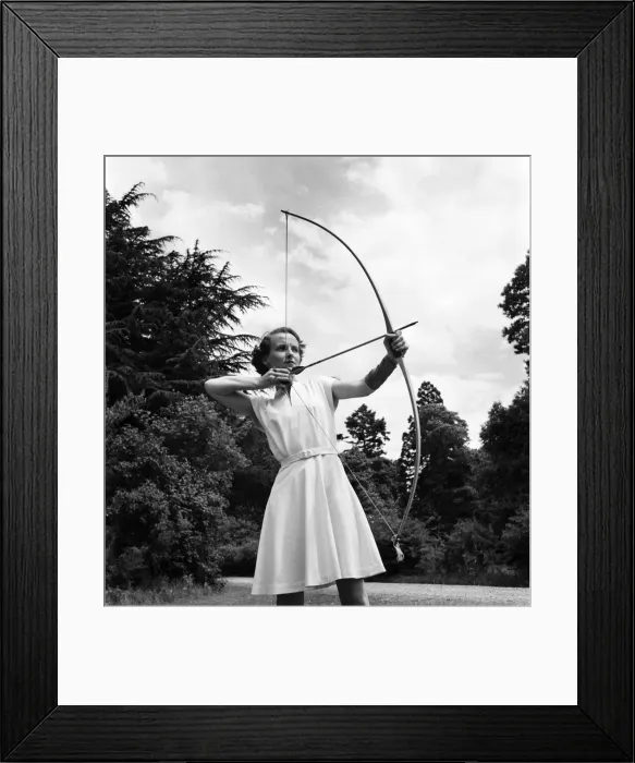 Framed Print : Bisham Abbey Physical recreation centre. A woman on the lawns in front of the Abbey get Framed Print : Bisham Abbey Physical recreation centre. A woman on the lawns in front of the Abbey get