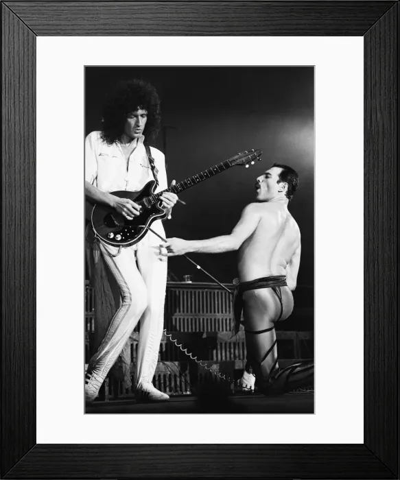 Framed Print : Rock group Queen in concert at Wembley Arena. Lead singer Freddie Mercury Framed Print : Rock group Queen in concert at Wembley Arena. Lead singer Freddie Mercury