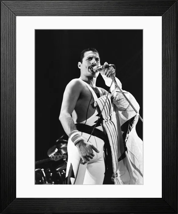 Framed Print : Rock group Queen in concert at Wembley Arena. Lead singer Freddie Mercury Framed Print : Rock group Queen in concert at Wembley Arena. Lead singer Freddie Mercury