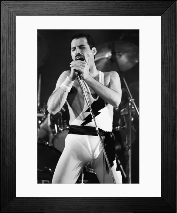 Framed Print : Rock group Queen in concert at Wembley Arena. Lead singer Freddie Mercury Framed Print : Rock group Queen in concert at Wembley Arena. Lead singer Freddie Mercury