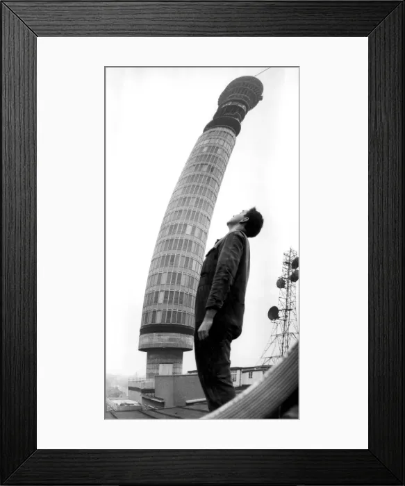 Framed Print : The GPO radio tower in London, appears to be leaning in this picture taken using a convex