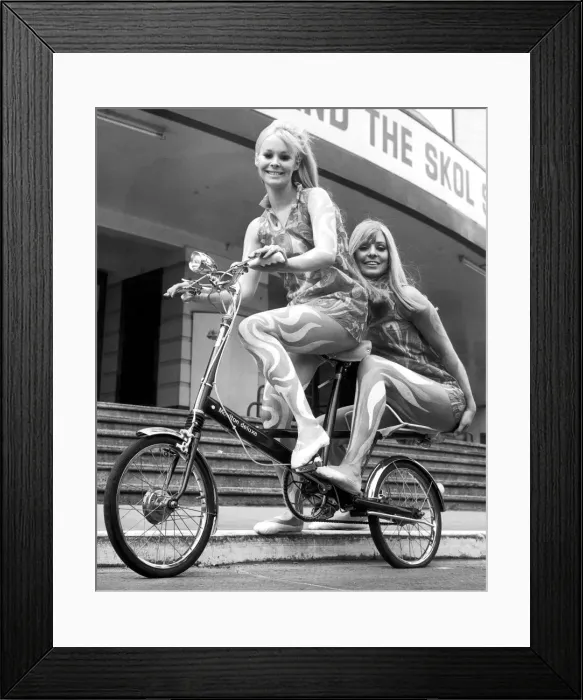 Framed Print : To help launch the Skol six day cycle race models Sue Donoghue