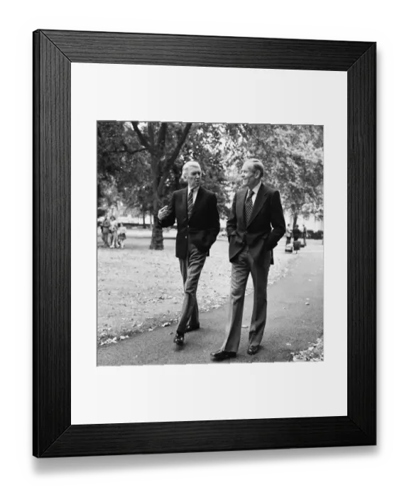 Framed Print : Hollywood stars Henry Fonda and James Stewart walk through Grosvenor Square in London Framed Print : Hollywood stars Henry Fonda and James Stewart walk through Grosvenor Square in London