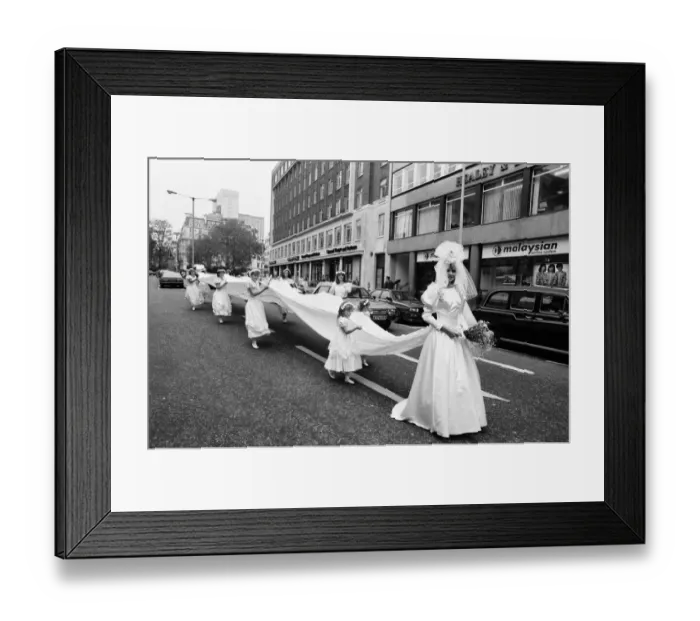 Framed Print : Model Michelle Hardy and a squad of bridesmaids show off her wedding dress Framed Print : Model Michelle Hardy and a squad of bridesmaids show off her wedding dress