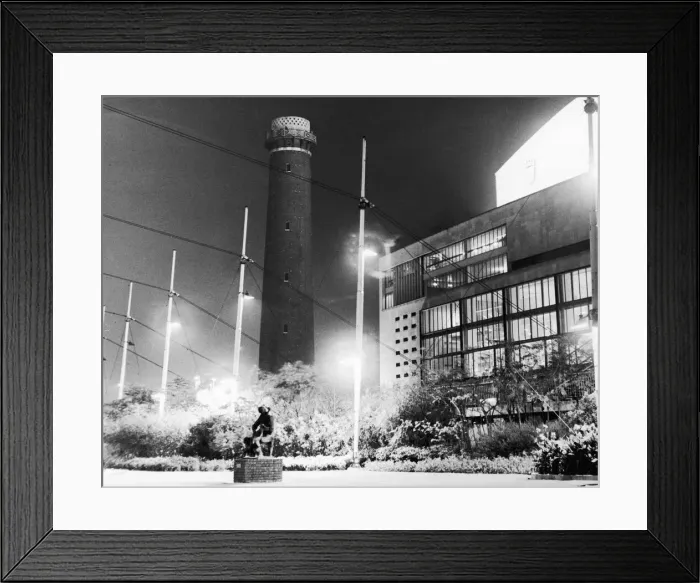 Framed Print : The Shot Tower on the South Bank of the River Thames stands surrounded by the bright Framed Print : The Shot Tower on the South Bank of the River Thames stands surrounded by the bright