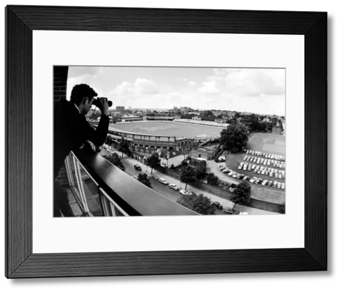Framed Print : Lords View. Johnathan Cree watching the first day of cricket from the balcony of his Framed Print : Lords View. Johnathan Cree watching the first day of cricket from the balcony of his