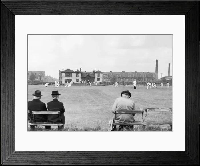 Framed Print : Spectators watching the action at Longsight Cricket Club in Manchester Framed Print : Spectators watching the action at Longsight Cricket Club in Manchester
