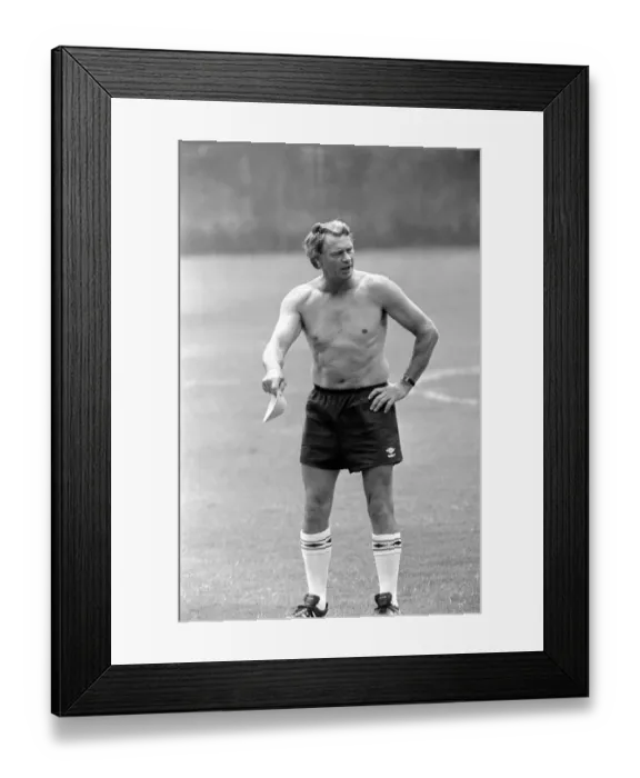 Framed Print : Bobby Robson - June 1986 England manager seen bare chested on the training ground