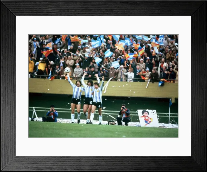 Framed Print : Argentina players (L - R) Luque, Kempes and Bertoni seen here celebrating their success