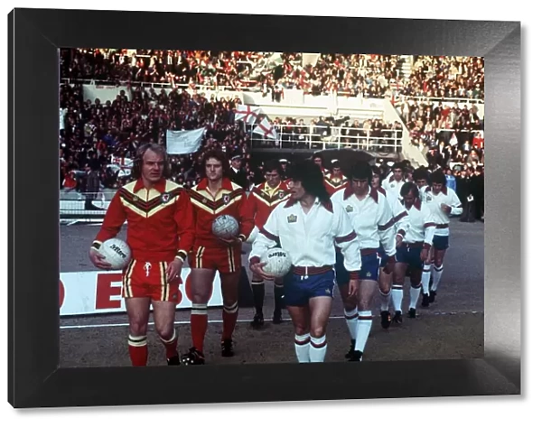 Football England v Wales 1977 The Team lead out. Kevin Keegan (R