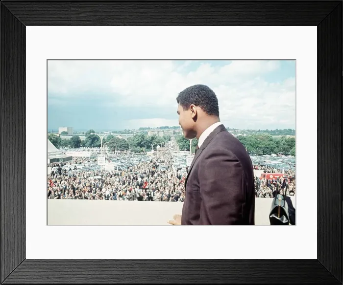 Framed Print : Cassius Clay watches the crowds arrive at Wembley Stadium for the World Cup final 1966 Framed Print : Cassius Clay watches the crowds arrive at Wembley Stadium for the World Cup final 1966