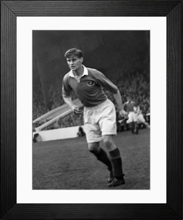 Framed Print : Jimmy Dickinson Portsmouth football player 1946-1965, Jimmy Dickinson holds