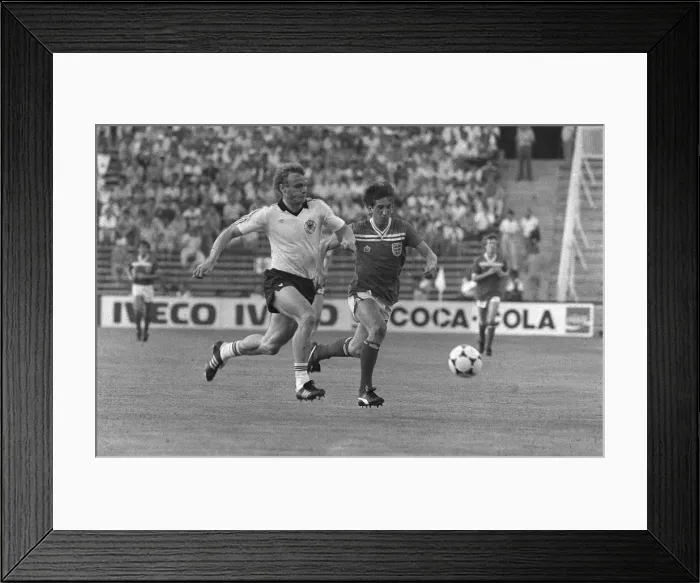 Framed Print : Paul Mariner and Hans Pieter Briegal during World cup 1982 England 0